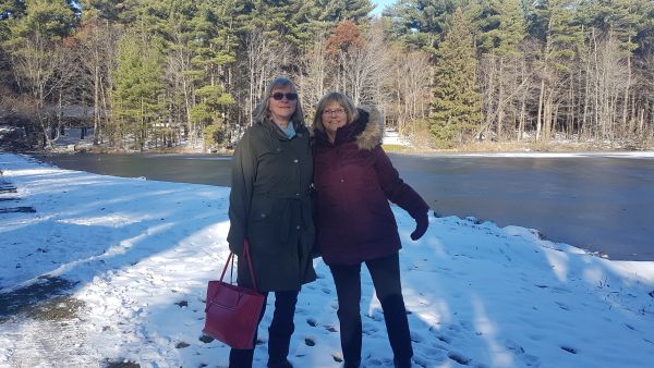 Sue and friend in winter snow